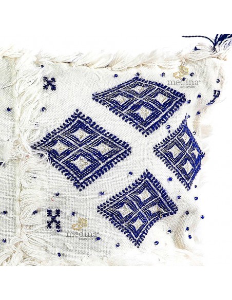 Coussin design berbere en laine vierge tissé main blanc et bleu